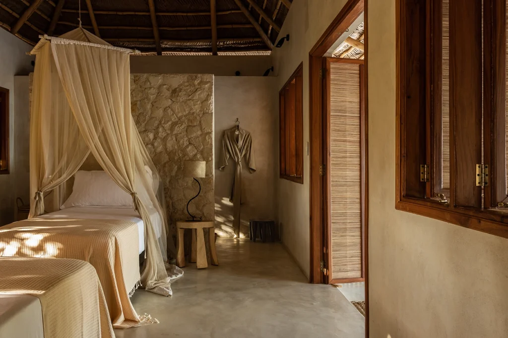 Beach lodge bedroom with neutral details.
